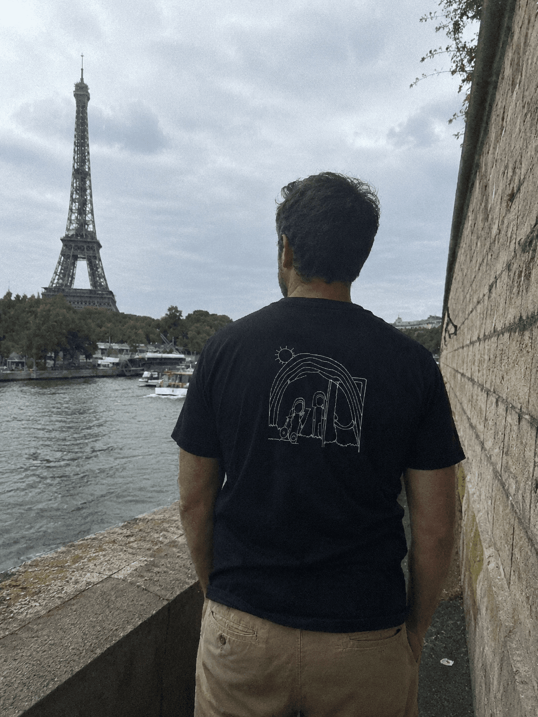 Omar wearing their custom Proud Daddy shirt